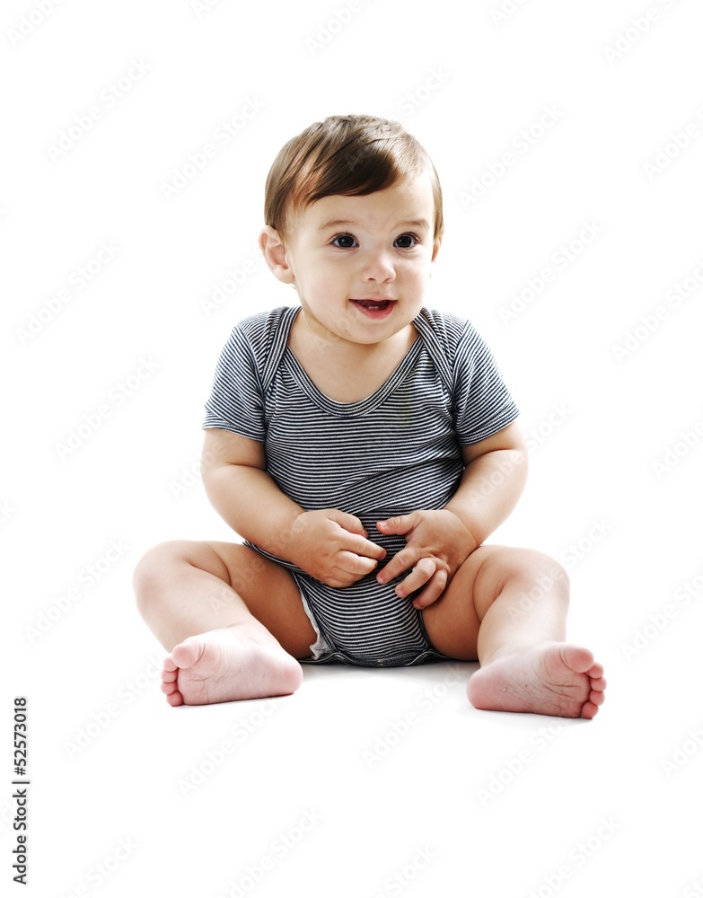 Baby is sitting on floor, isolated on white Baby is sitting on floor, isolated on white