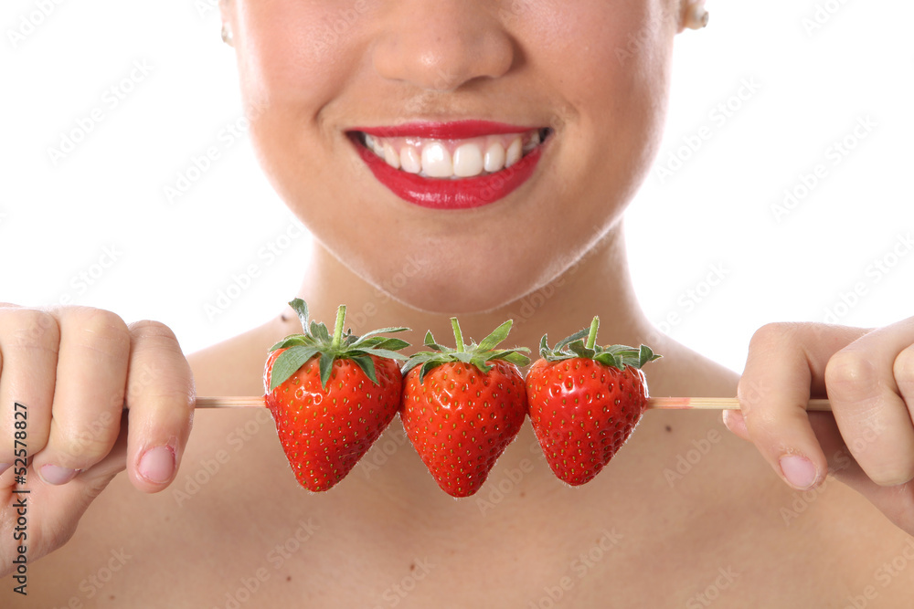 Model Released. Young Woman Eating Strawberries Model Released. Young Woman Eating Strawberries