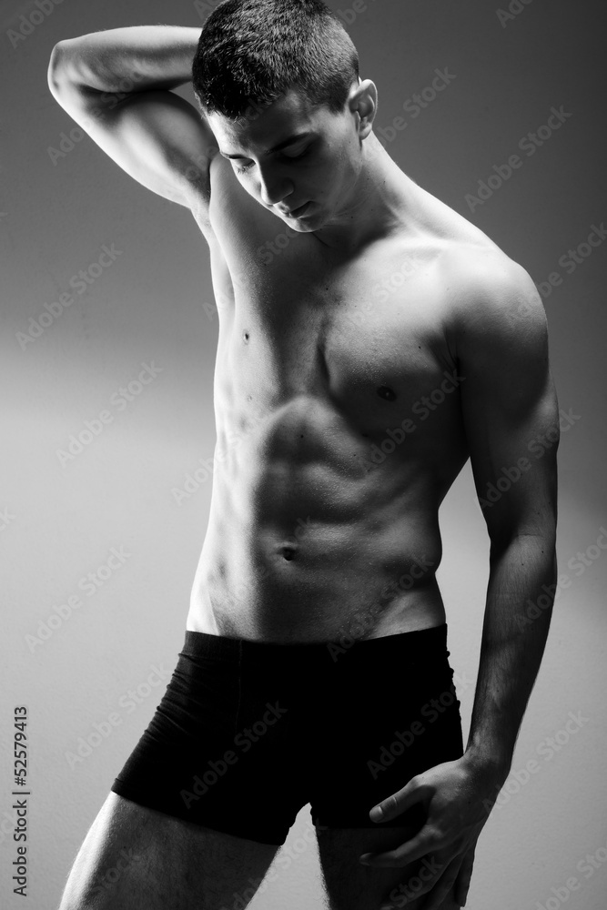 Fototapeta premium Young sexy muscular man posing