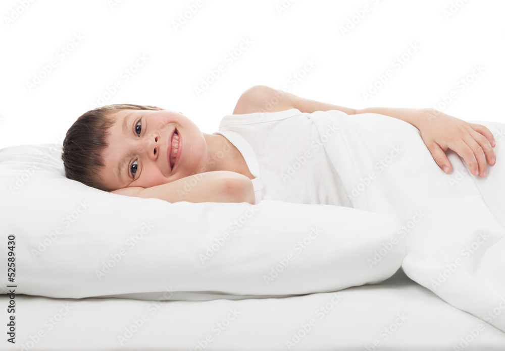 cheerful boy in bed cheerful boy in bed