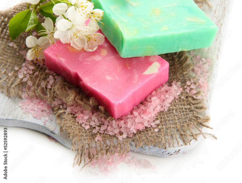 Natural handmade soap on wooden desk, isolated on white Natural handmade soap on wooden desk, isolated on white