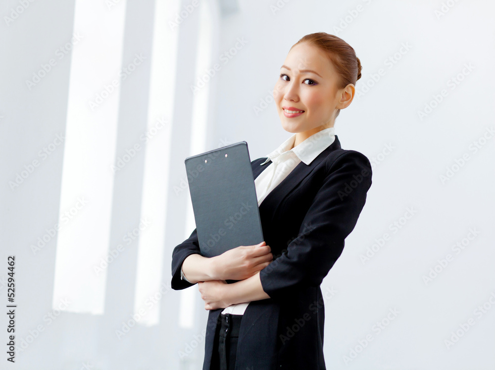 Attractive asian businesswoman in formal suit Attractive asian businesswoman in formal suit