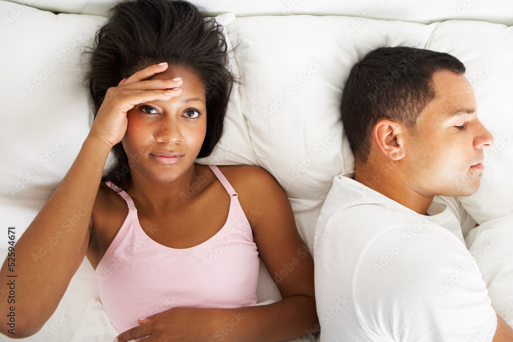 Couple In Bed With Relationship Difficulties Couple In Bed With Relationship Difficulties