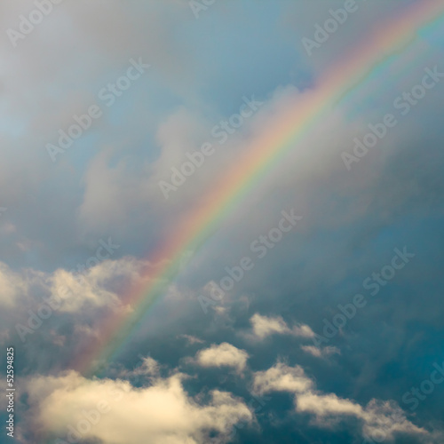 Grunge cloud sky with rainbow background