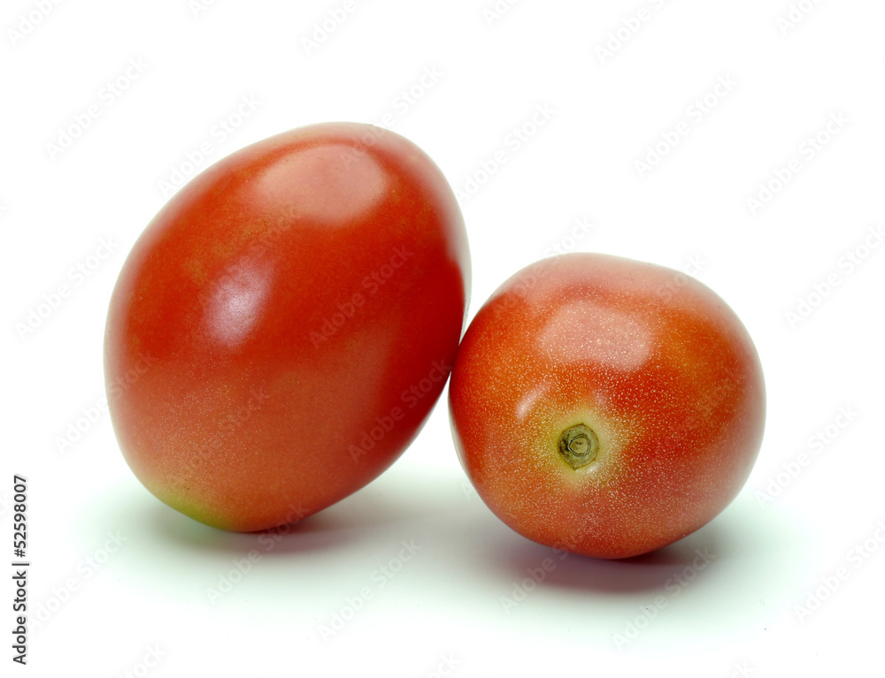 Two tomatoes on white background. Two tomatoes on white background.