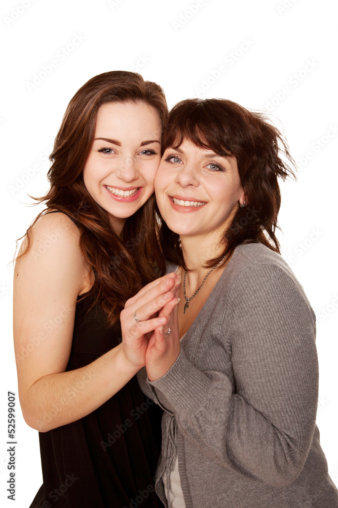 Mother and teenage daughter together. Happy family.