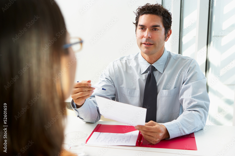 Businessman Interviewing Female Candidate For Job Businessman Interviewing Female Candidate For Job