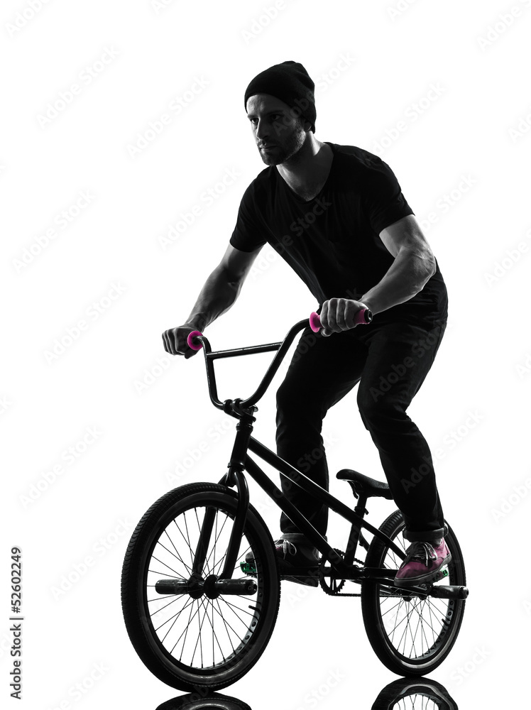 Obraz premium man bmx acrobatic figure silhouette