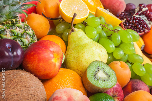 Huge group of fresh fruits isolated on a white background.