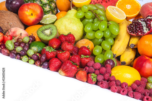 Huge group of fresh fruits isolated on a white background.