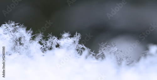 Snowflake in blue snow © Nneirda