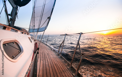 Sailing regatta in Greece  during sunset.