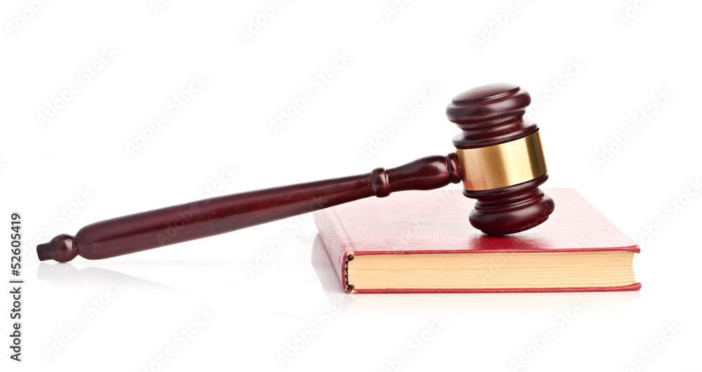 Judge's gavel on red legal book