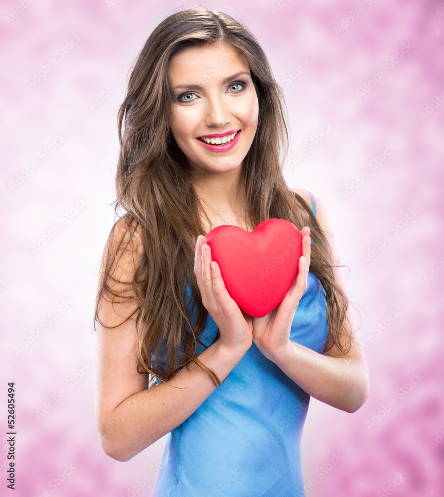 Happy smile woman holding red heart. Female model hold valentine Happy smile woman holding red heart. Female model hold valentine