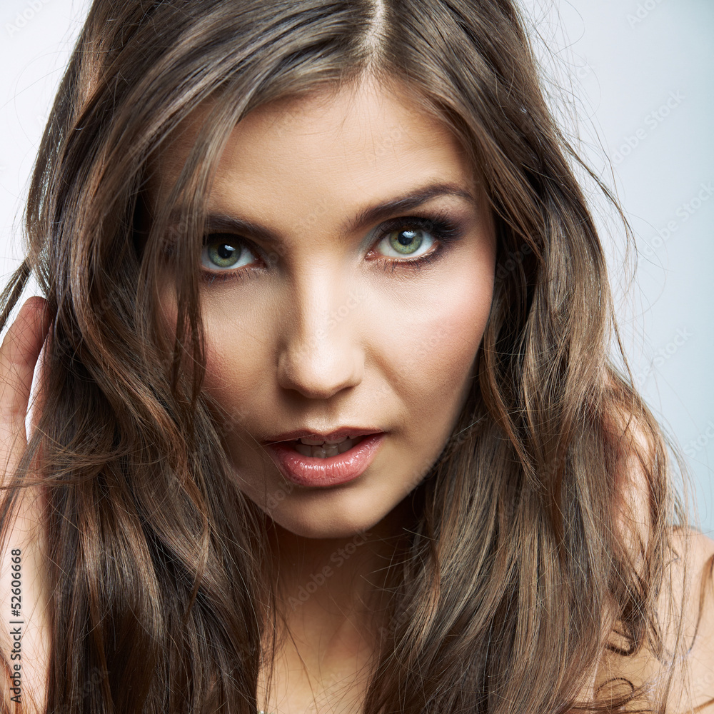 Woman face close up beauty portrait. Female model isolated. Woman face close up beauty portrait. Female model isolated.