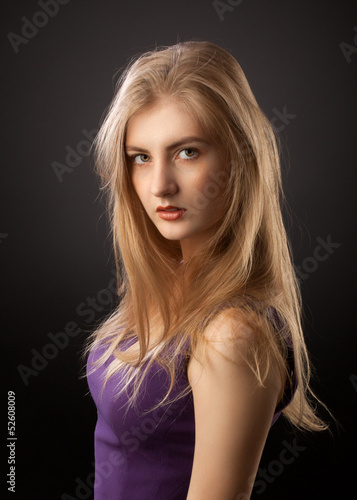 blonde girl in purple dress