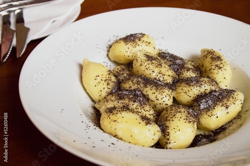 Potato dumplings with poppy seeds