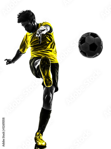 Fototapeta Naklejka Na Ścianę i Meble -  brazilian soccer football player young man kicking silhouette