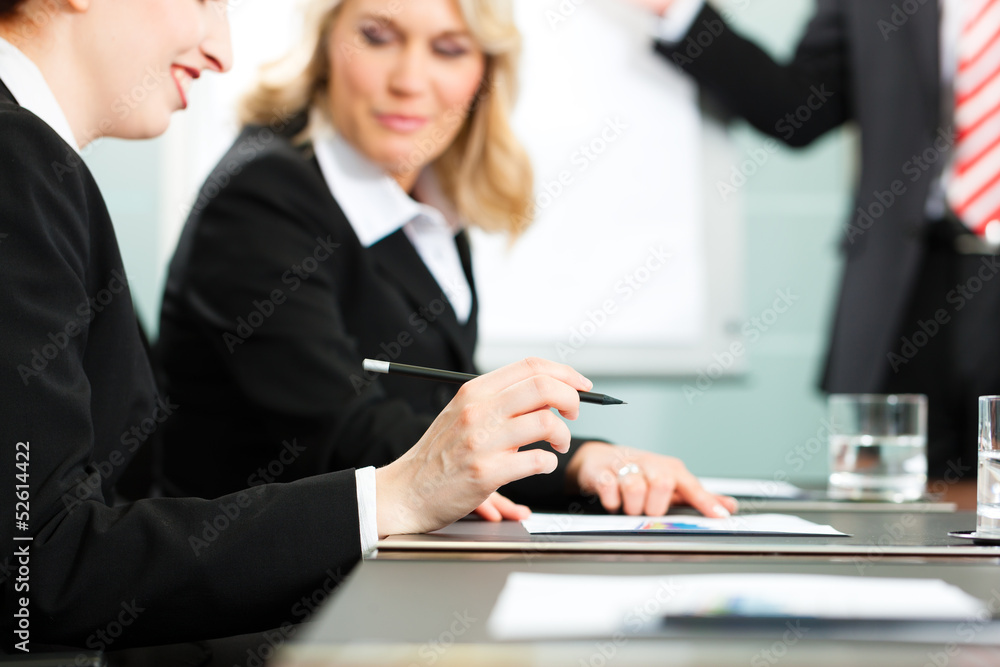 Business meeting with work on contract Business meeting with work on contract