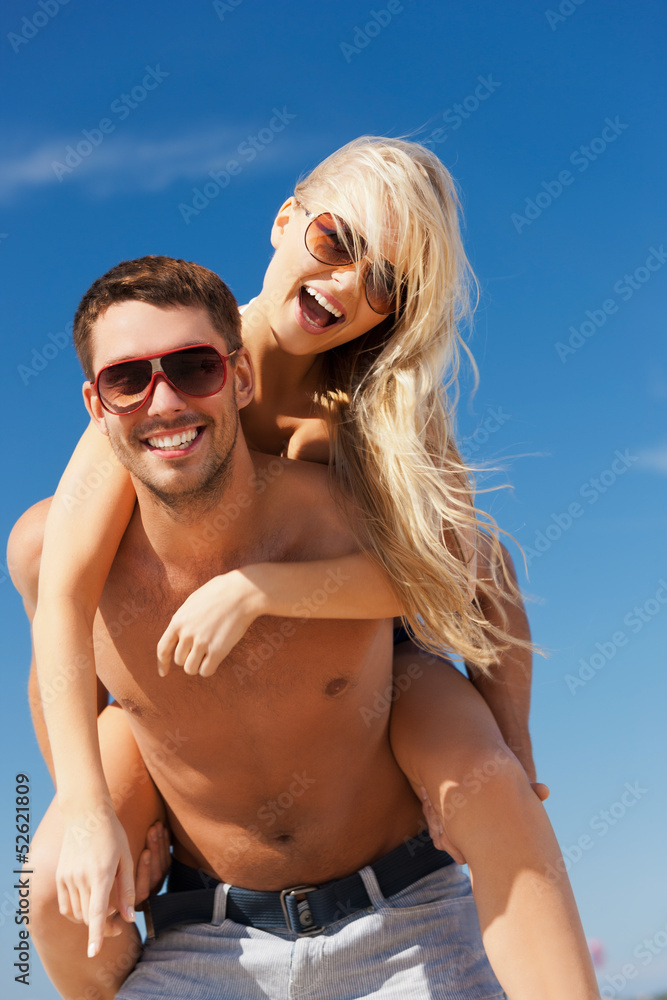 couple having fun on the beach couple having fun on the beach