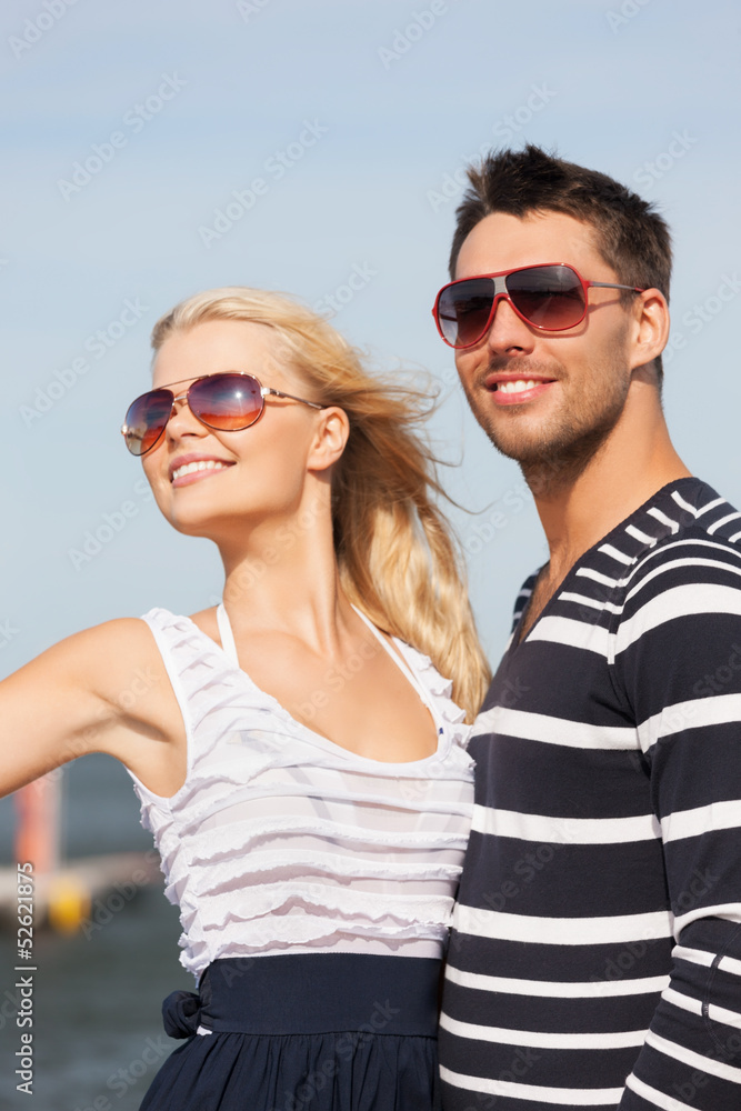 happy young couple in port happy young couple in port