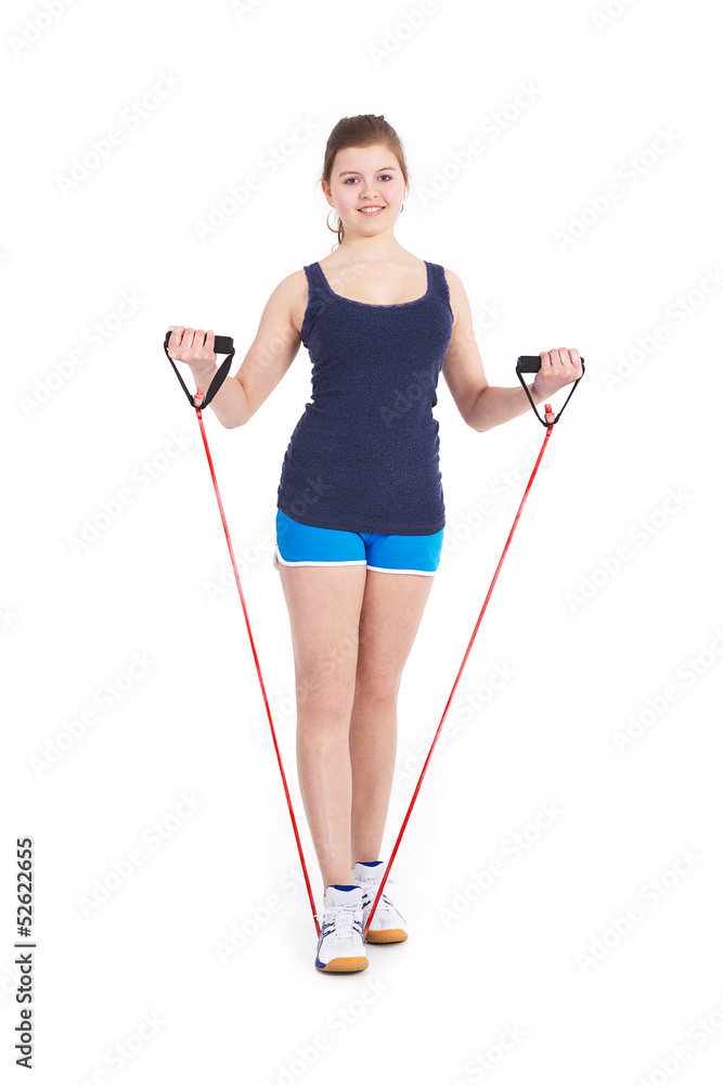 Sportliches Mädchen mit Gummiband trainiert Porträt Sportliches Mädchen mit Gummiband trainiert Porträt