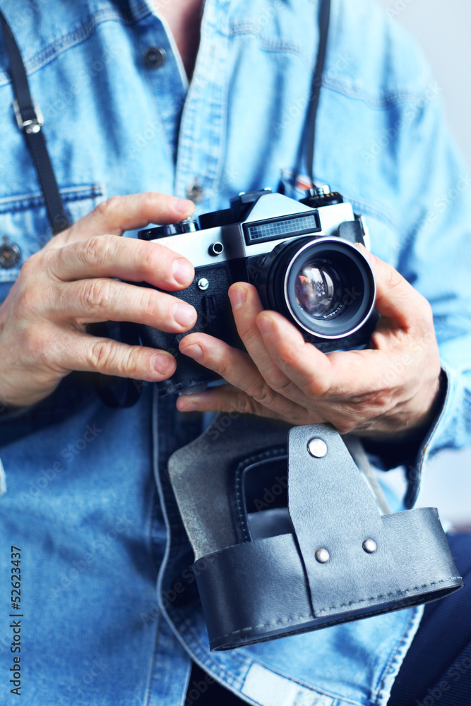 Image of reporter with film camera Image of reporter with film camera