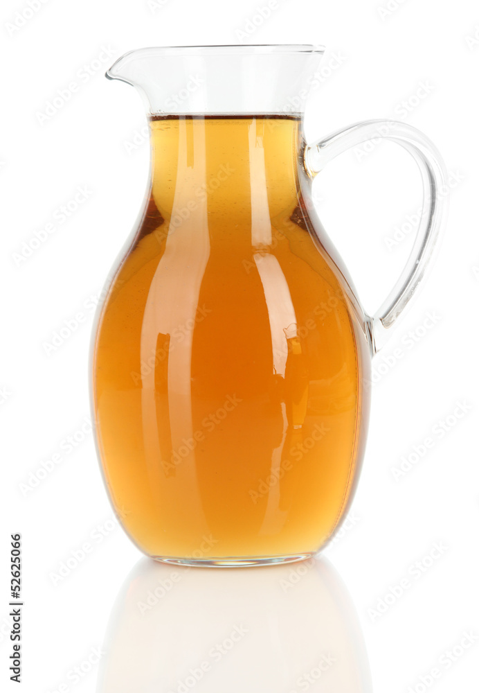 Apple juice in pitcher isolated on white Apple juice in pitcher isolated on white