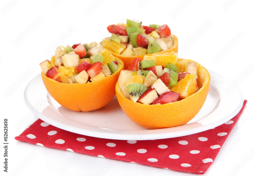 Fruit salad in hollowed-out orange isolated on white Fruit salad in hollowed-out orange isolated on white
