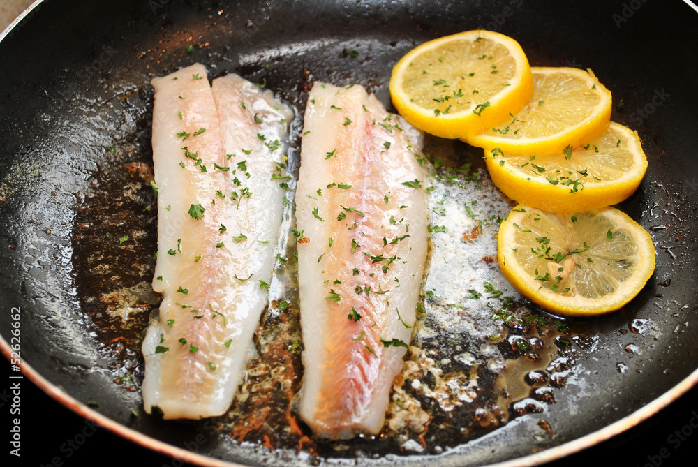 Cooking Fish for a Healthy Dinner Stock Photo | Adobe Stock