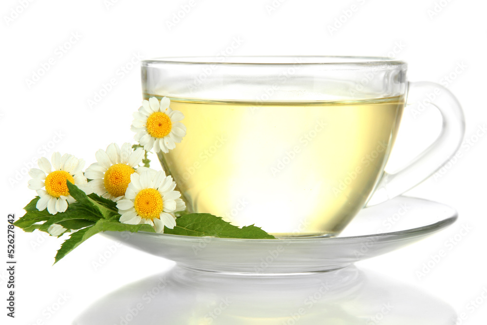 Cup of herbal tea with wild camomiles and mint, isolated Cup of herbal tea with wild camomiles and mint, isolated