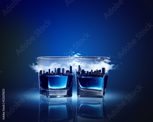 Two glasses of blue liquid