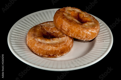 Glazed Donut Isolated on a Black Background © digidreamgrafix