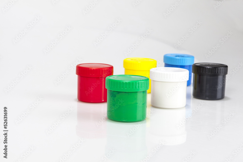 red and green paint boxes with brushes red and green paint boxes with brushes