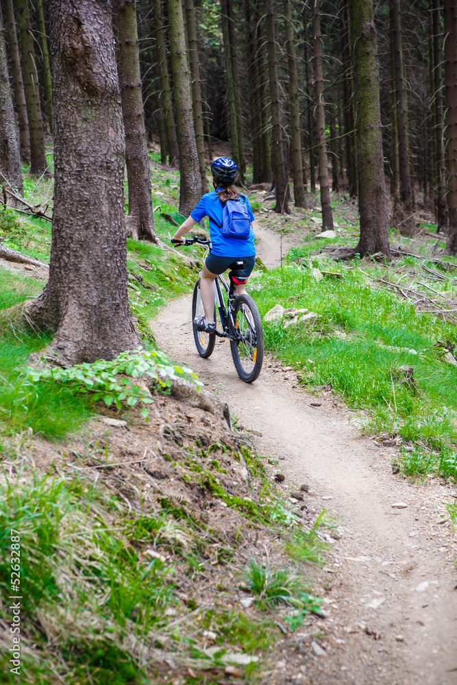 Healthy lifestyle - teenage girl biking Healthy lifestyle - teenage girl biking