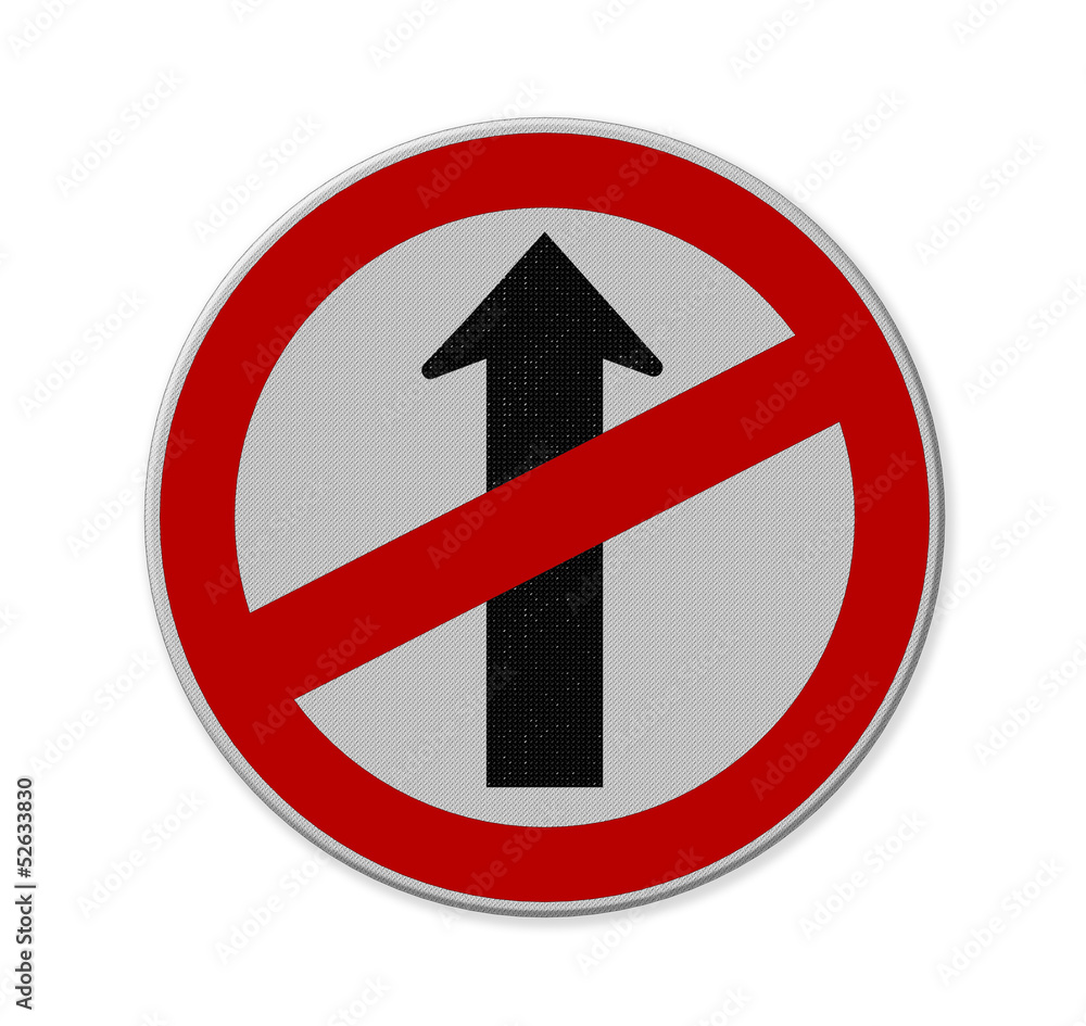 Do not go straight sign on the white canvas in rural town. Do not go straight sign on the white canvas in rural town.