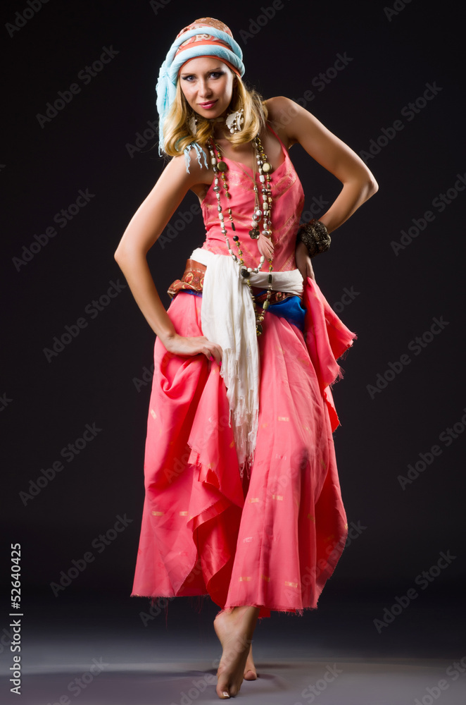 Woman dancing spanish dances on white Woman dancing spanish dances on white