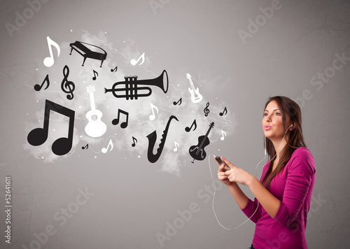 Beautiful young woman singing and listening to music with musica