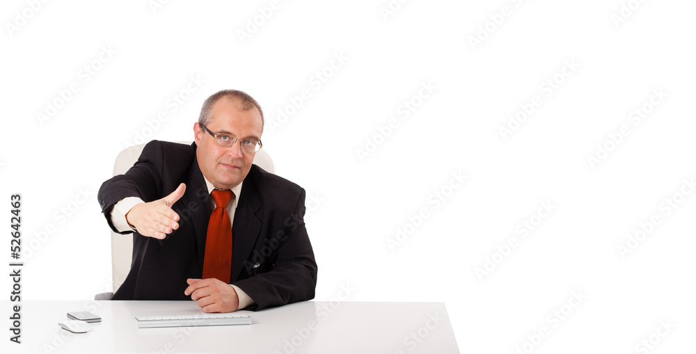 businessman sitting at desk with copy space businessman sitting at desk with copy space