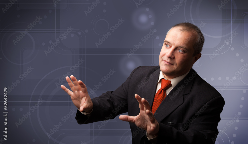 Elegant businessman touching copy space Elegant businessman touching copy space
