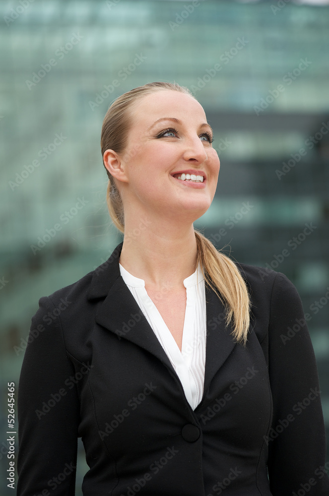Young business woman smiling outdoors Young business woman smiling outdoors