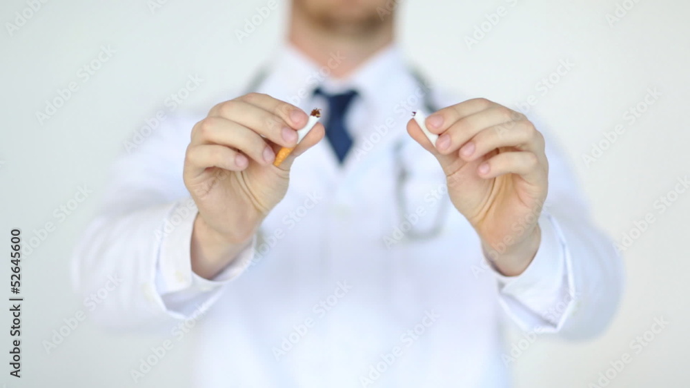 professional doctor breaking the cigarette professional doctor breaking the cigarette
