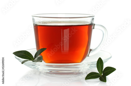 Cup of tea with green leaves on a white background .