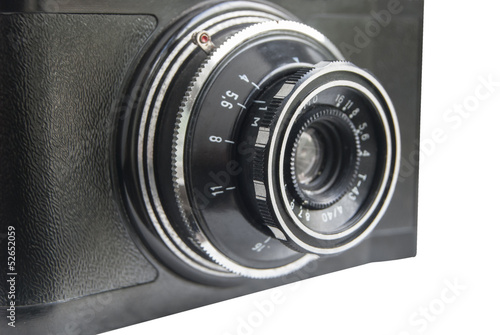 Old vintage analog camera close-up on white background