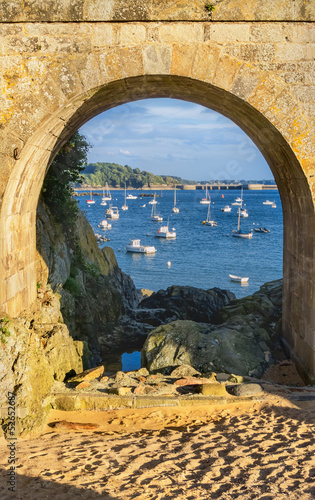 A view of the Solidor Bay via an arch of Solidor Tour complex