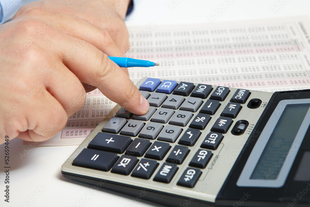 The businessman and calculator The businessman and calculator