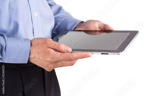 Young businessman's hands working on a tablet pc comuter © len44ik