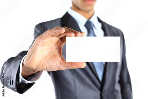 Business man holding blank business card isolated on white