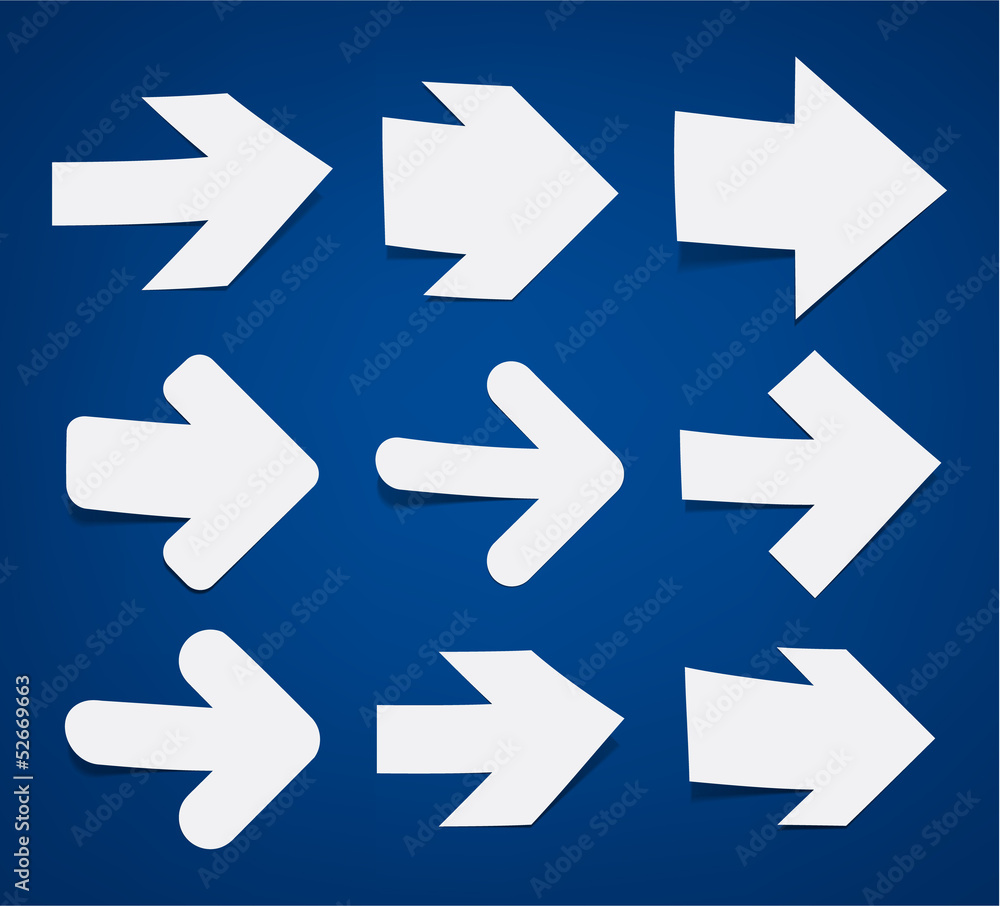White paper arrows. White paper arrows.
