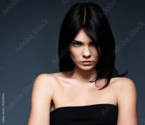 Fotografi Young beautiful strict brunette woman